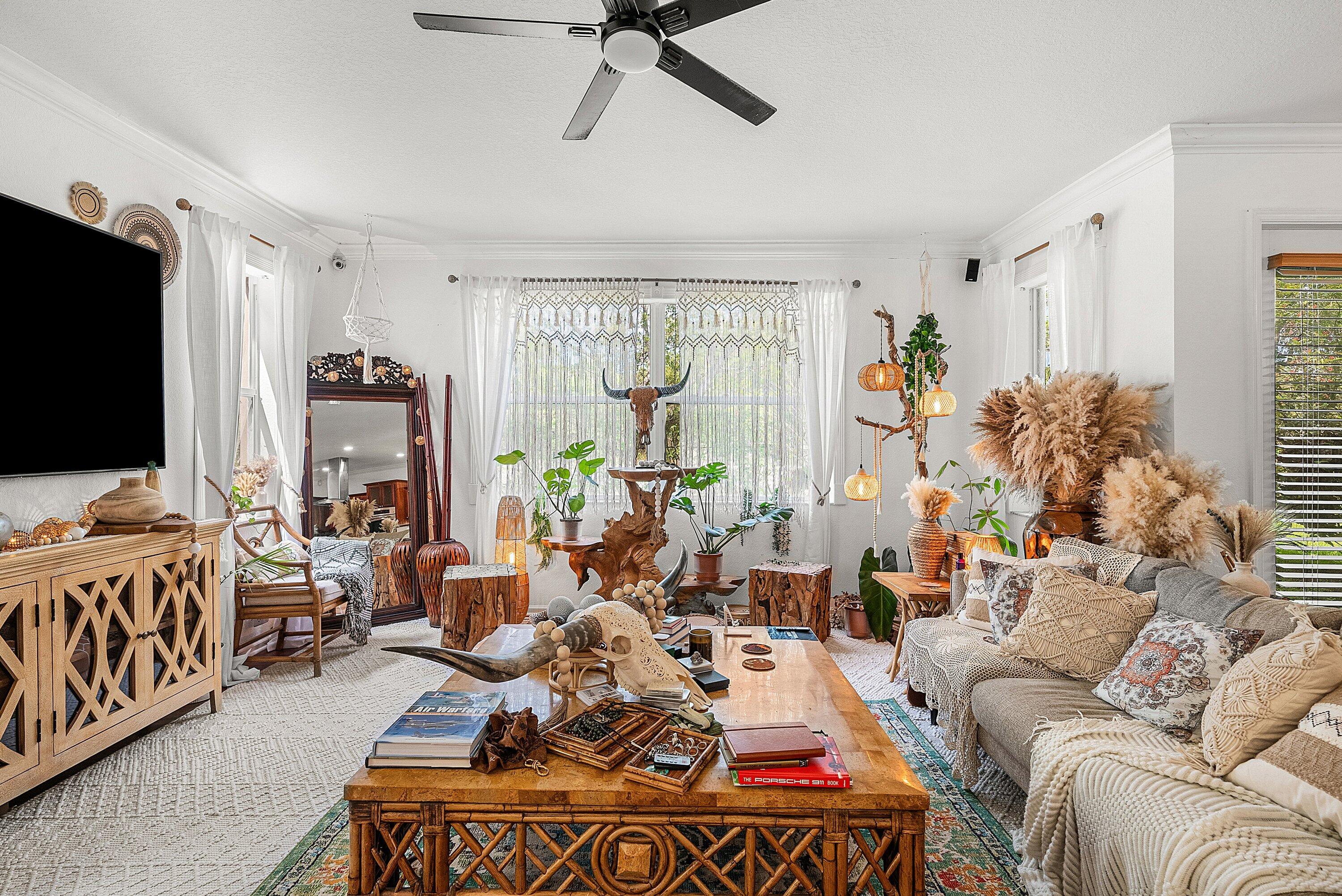 1509 Sage Wood Court Riviera Beach, FL 33404 - Photo 12 of 59 a living room with furniture and a flat screen tv