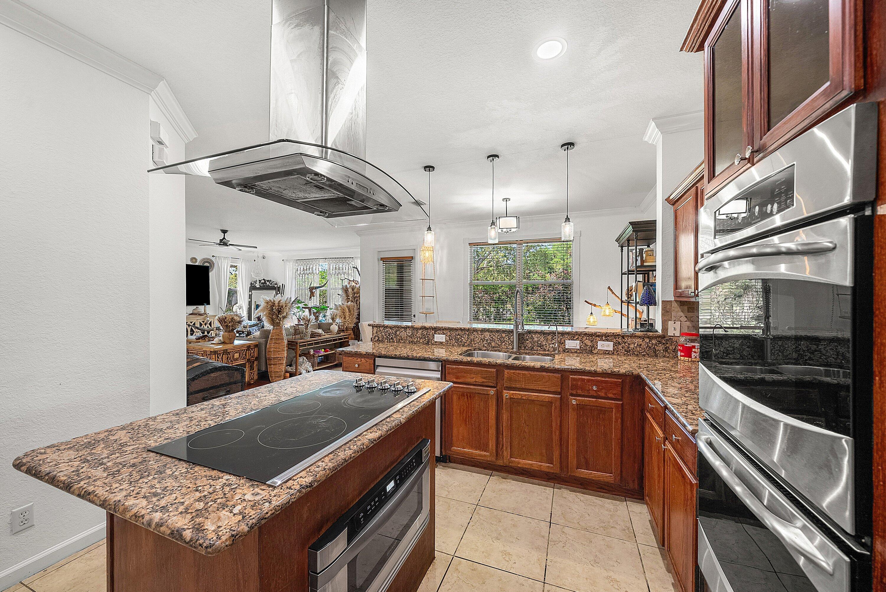 1509 Sage Wood Court Riviera Beach, FL 33404 - Photo 19 of 59 a kitchen with lots of counter top space
