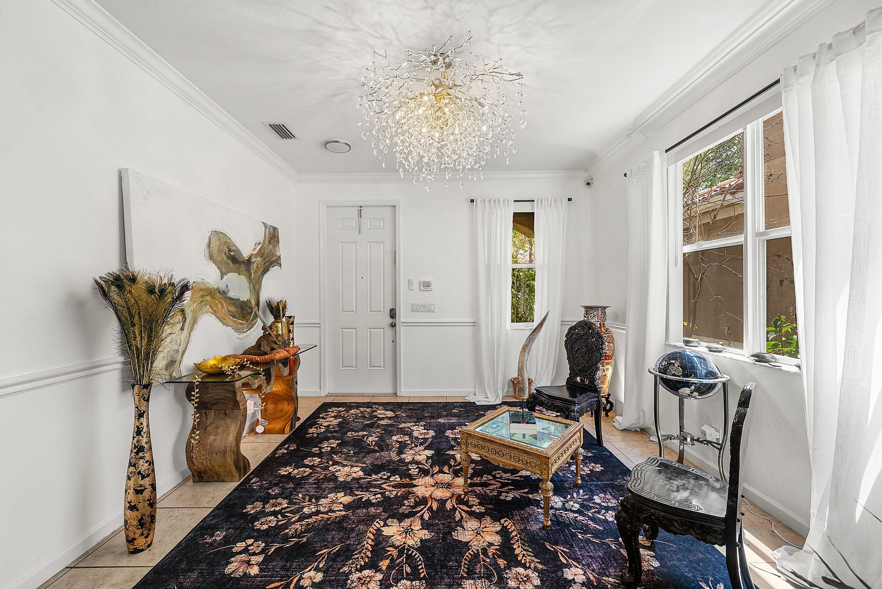 1509 Sage Wood Court Riviera Beach, FL 33404 - Photo 6 of 59 a bedroom with furniture and a window