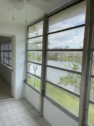 a view of a large window with an outdoor space