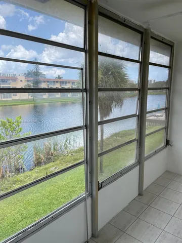 a view of a lake from a window