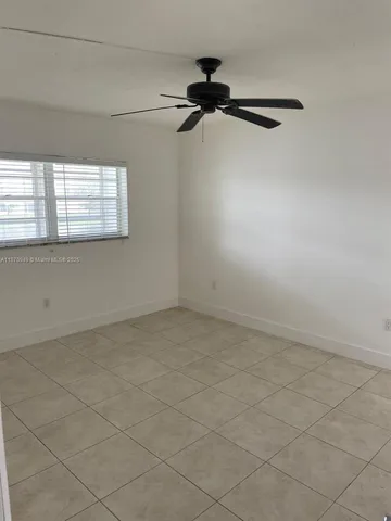 en empty room with windows