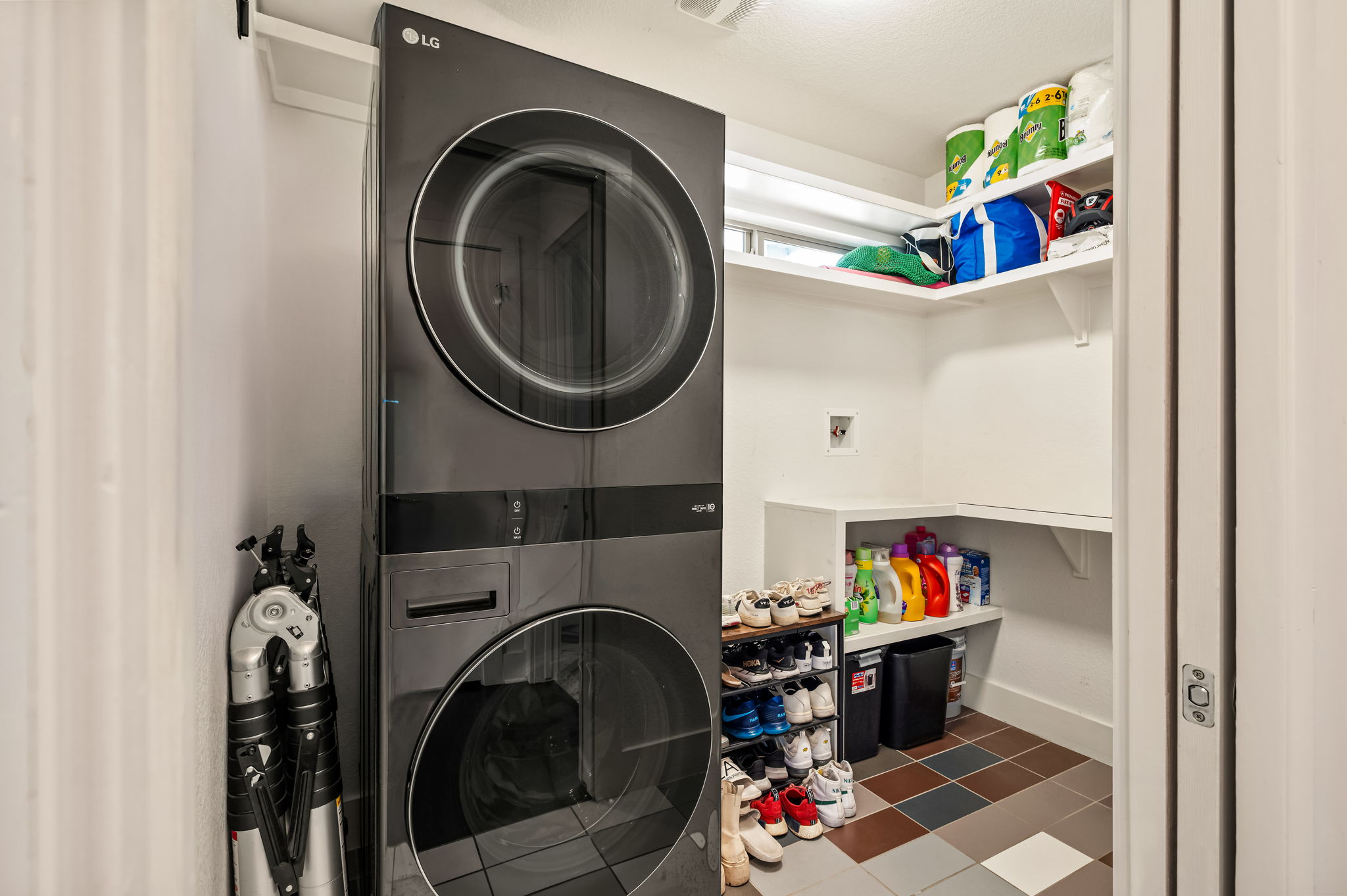 1124 Linden Street, Unit B Austin, TX 78702 - Photo 16 of 26 Laundry area with stacked washer / drying machine and dark flooring