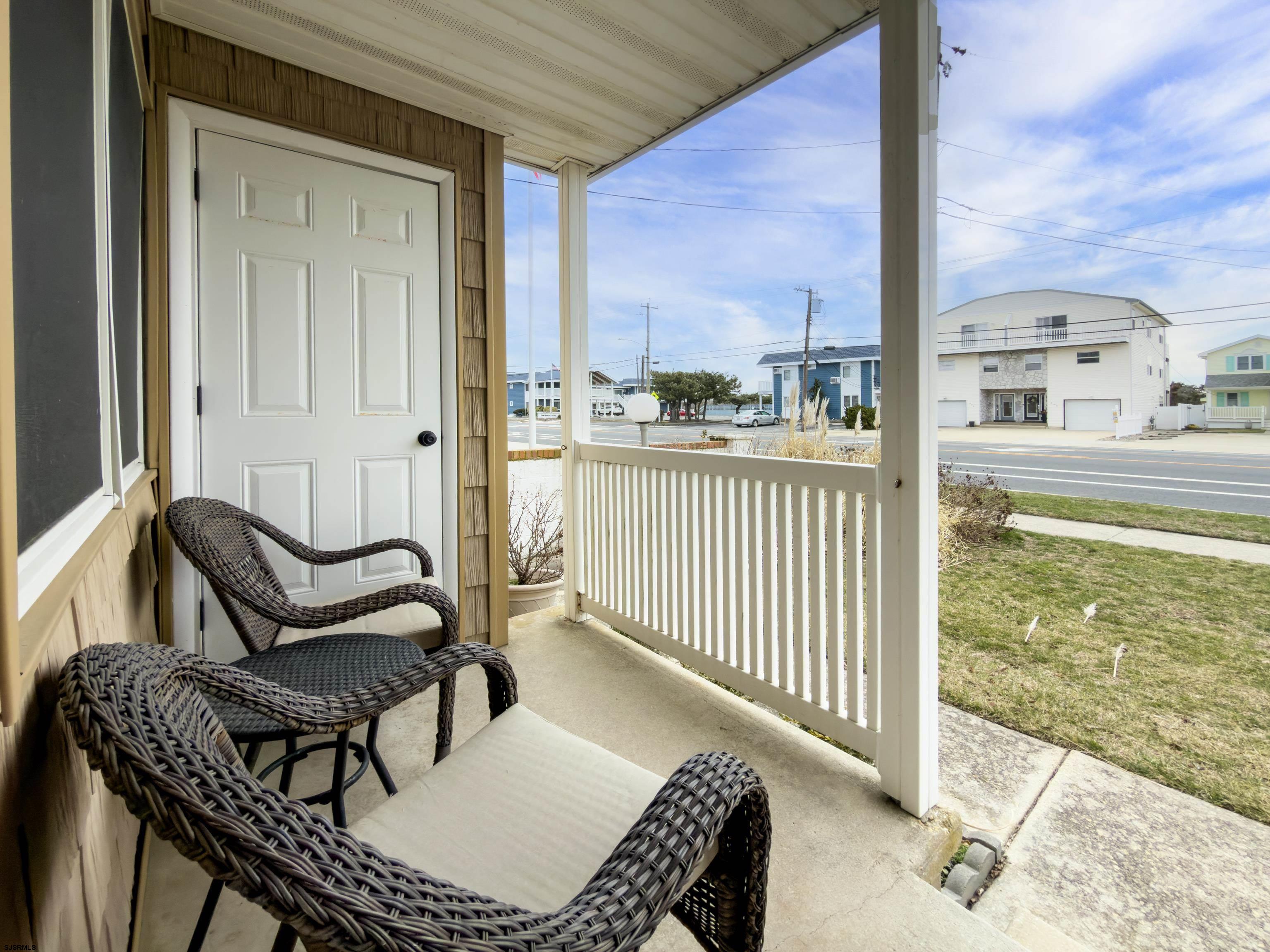 313 West Brigantine Avenue, Unit 4 Brigantine, NJ 08203 - Photo 19 of 38 a balcony view with a couch