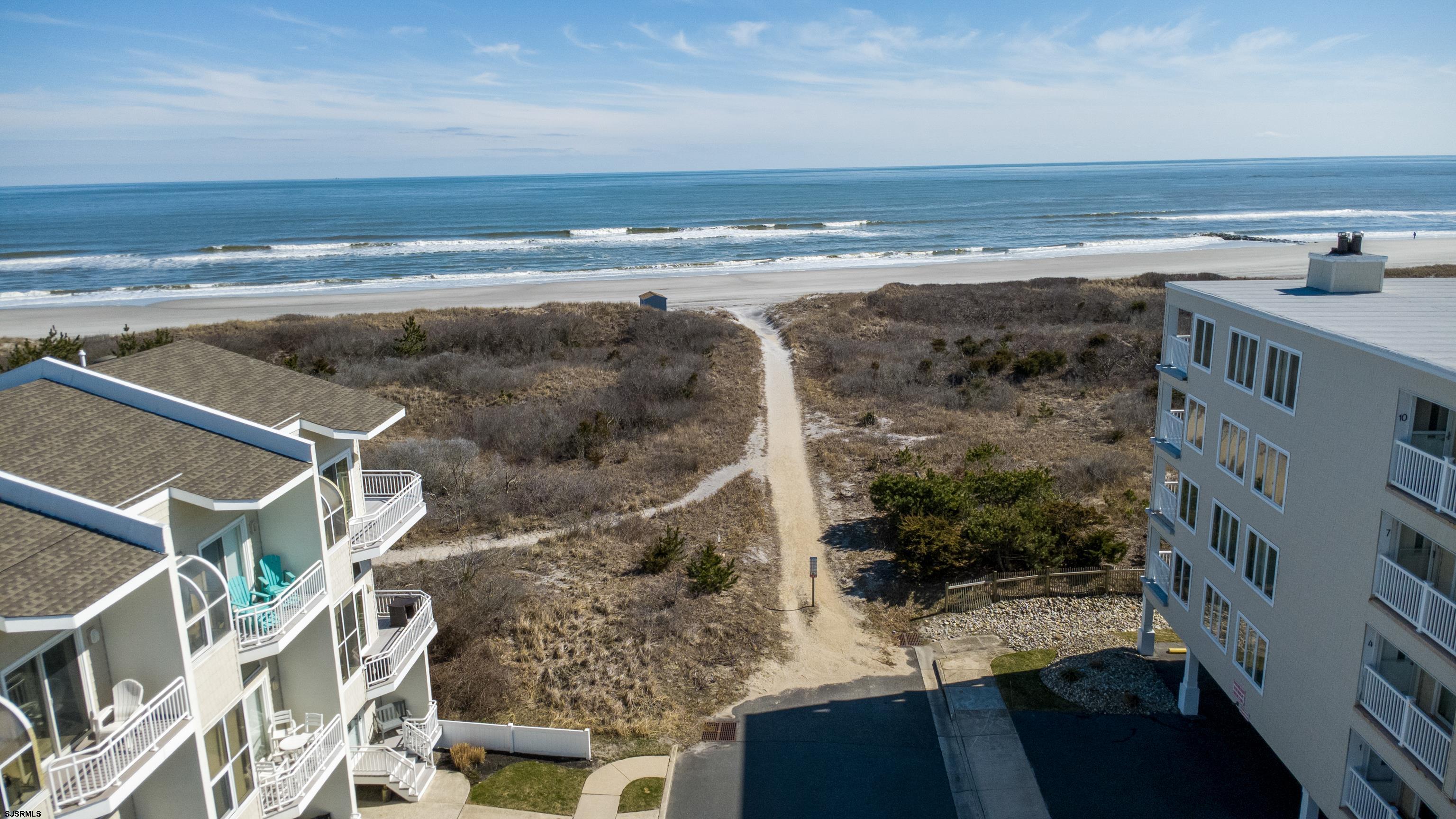 313 West Brigantine Avenue, Unit 4 Brigantine, NJ 08203 - Photo 29 of 38 a view of building with an ocean view