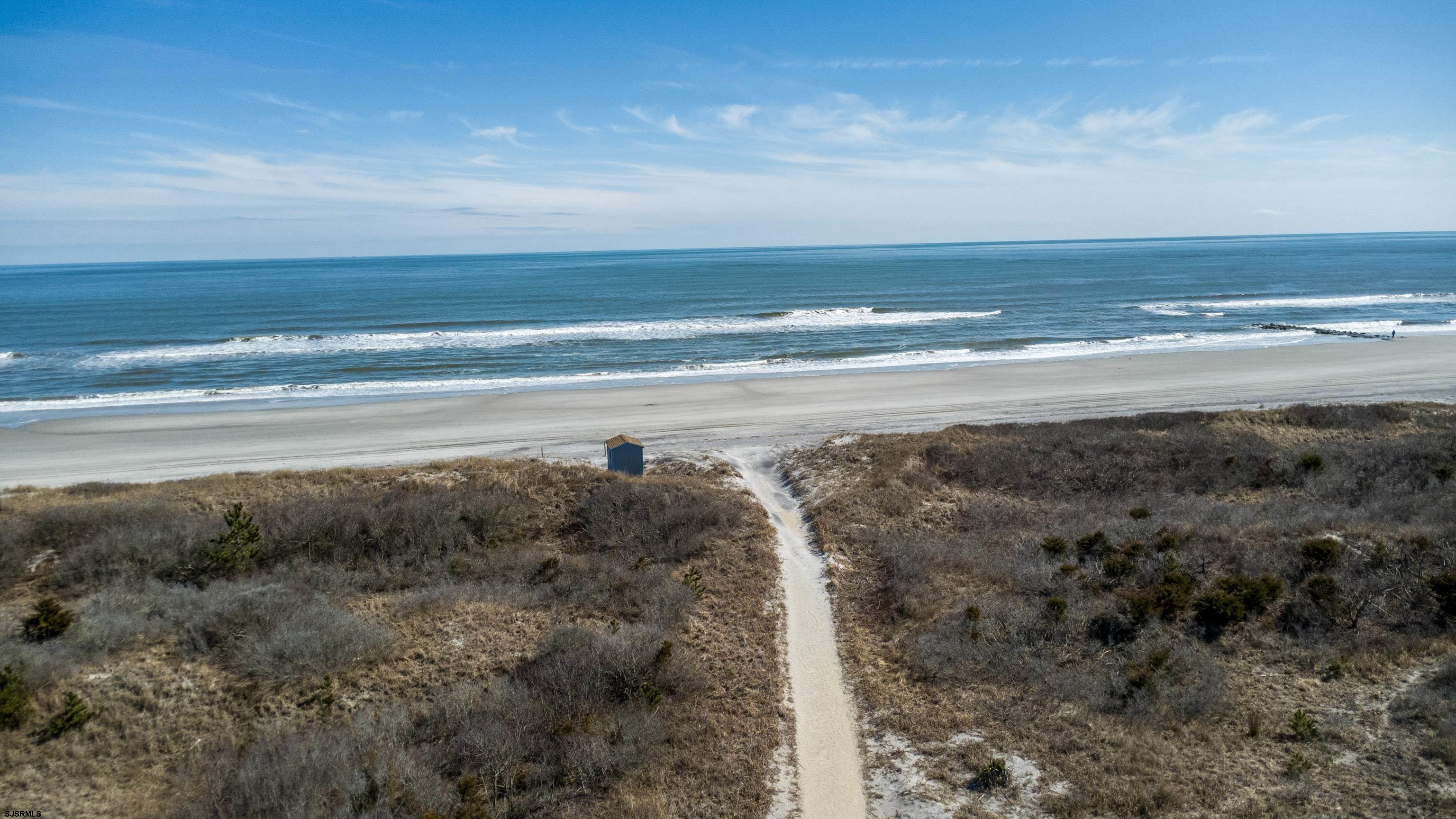 313 West Brigantine Avenue, Unit 4 Brigantine, NJ 08203 - Photo 31 of 38 a view of an ocean beach