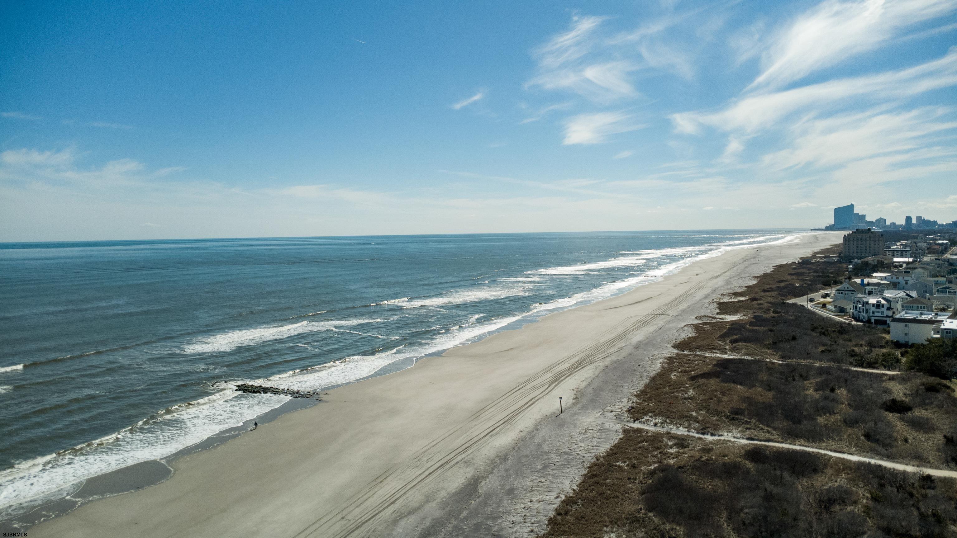 313 West Brigantine Avenue, Unit 4 Brigantine, NJ 08203 - Photo 4 of 38 a view of an ocean beach