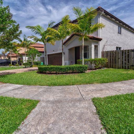 a house view with a garden space