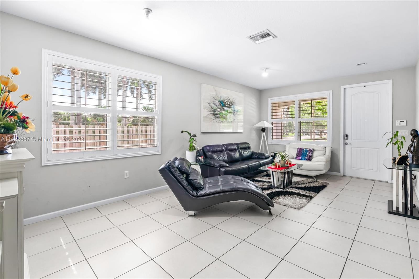 11850 Southwest 250th Terrace Homestead, FL 33032 - Photo 19 of 47 a living room with furniture and a window