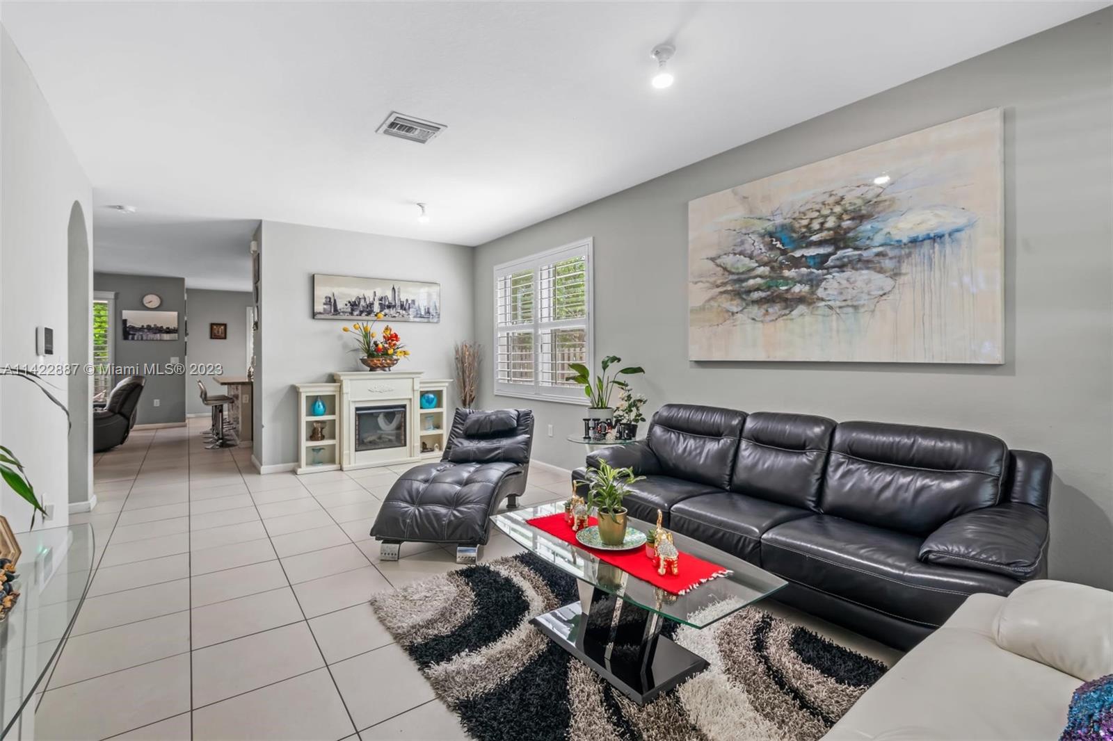 11850 Southwest 250th Terrace Homestead, FL 33032 - Photo 20 of 47 a living room with furniture and a couch