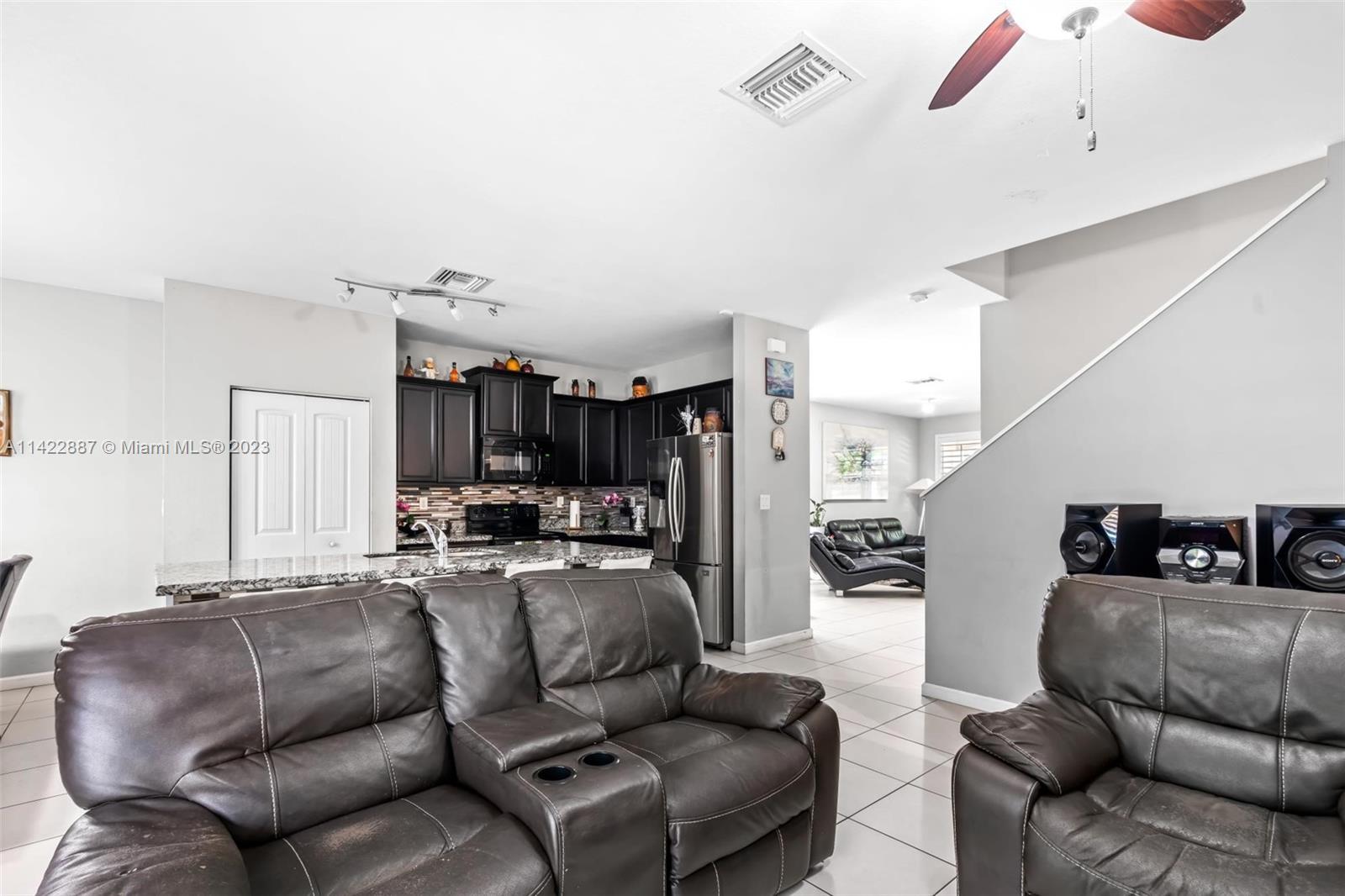 11850 Southwest 250th Terrace Homestead, FL 33032 - Photo 25 of 47 a living room with furniture and a couch