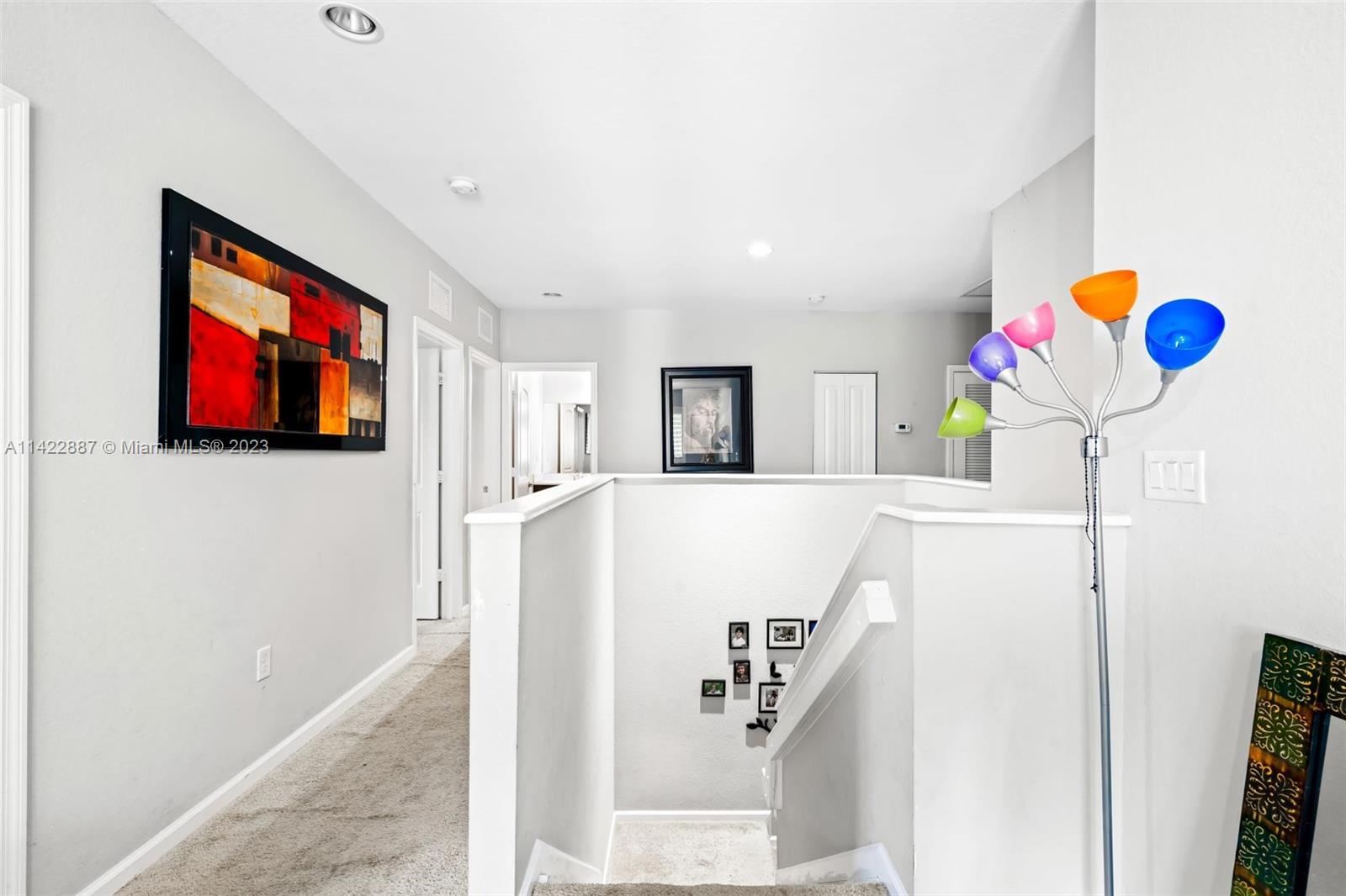 11850 Southwest 250th Terrace Homestead, FL 33032 - Photo 29 of 47 a kitchen with a refrigerator and a flat screen tv