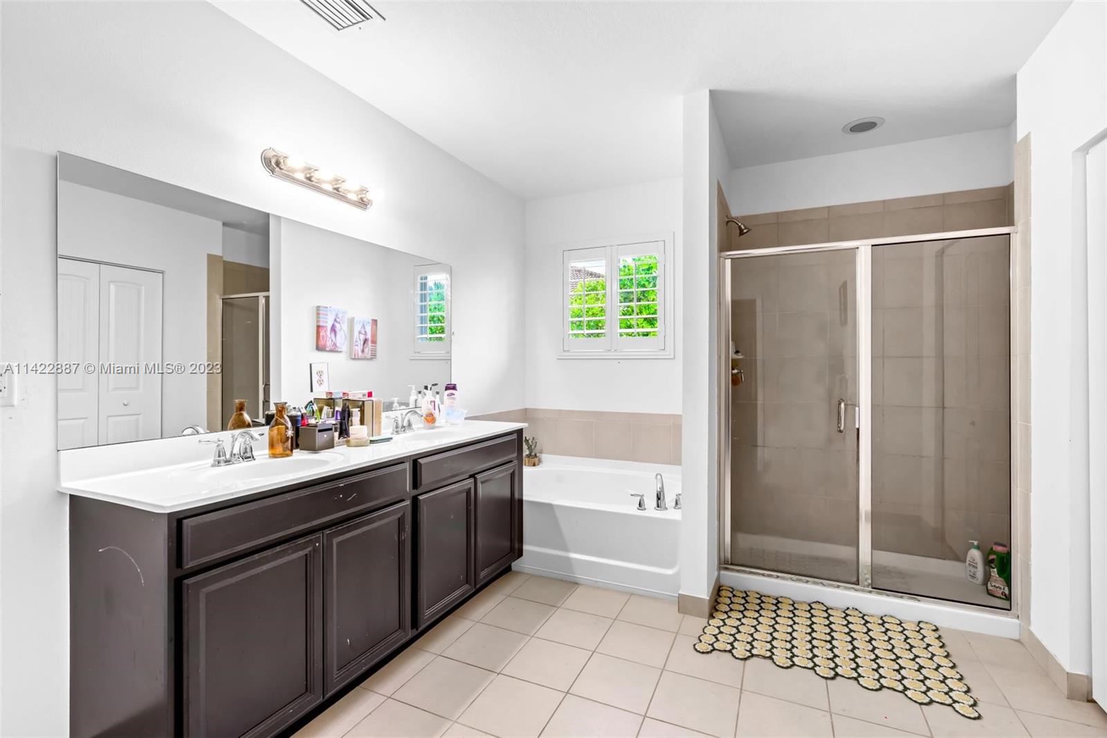 11850 Southwest 250th Terrace Homestead, FL 33032 - Photo 34 of 47 a bathroom with a sink a toilet and shower