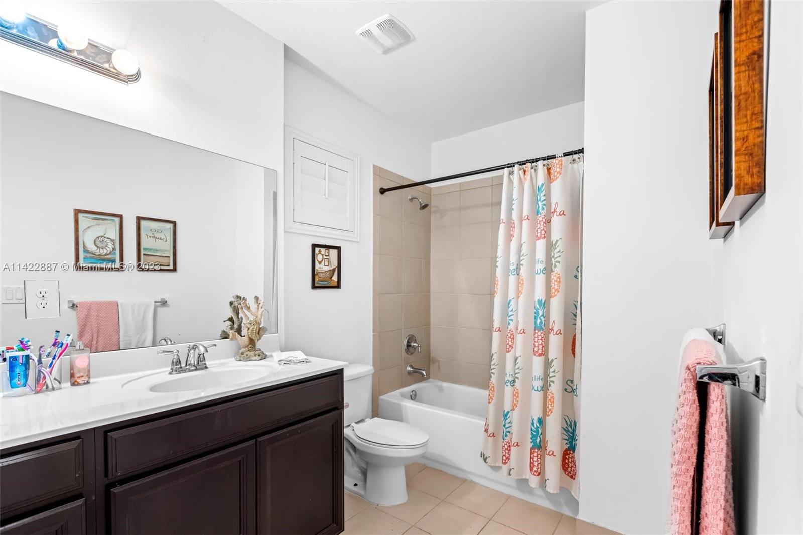 11850 Southwest 250th Terrace Homestead, FL 33032 - Photo 38 of 47 a bathroom with a double vanity sink toilet and shower