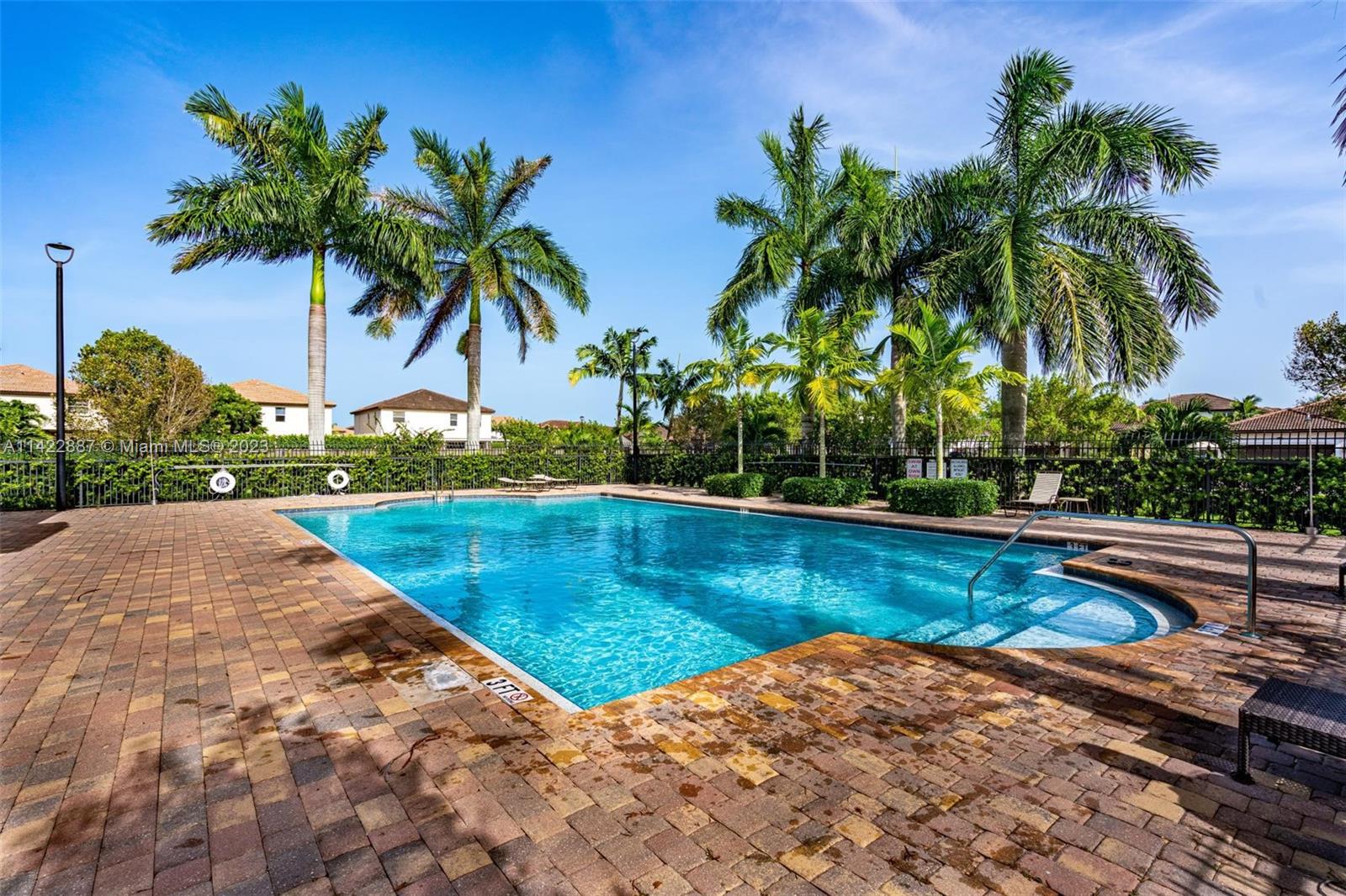 11850 Southwest 250th Terrace Homestead, FL 33032 - Photo 43 of 47 a view of a swimming pool and lounge chair