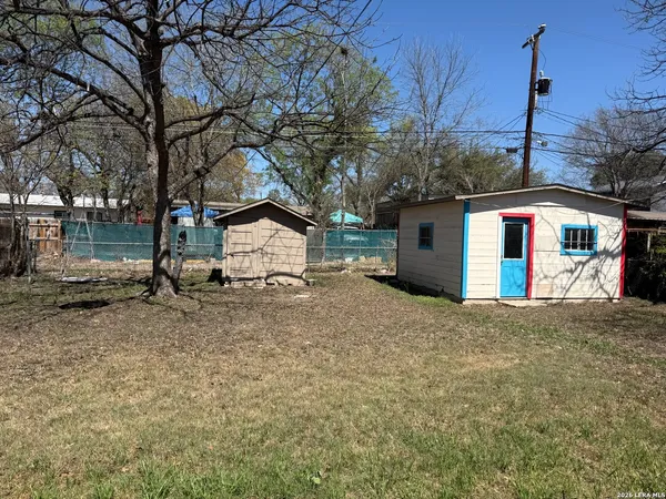 a house with trees in front of it