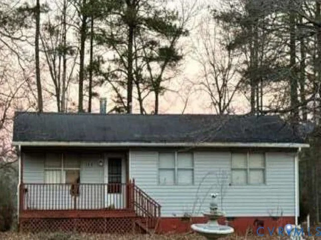 a front view of a house with garage