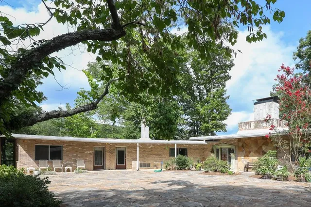 a view of a patio filled with furniture