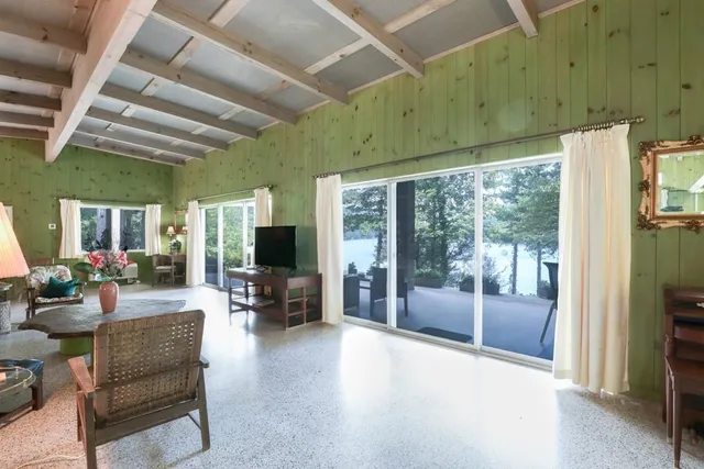 a bathroom with a sink vanity and mirror
