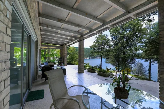 a bathroom with a shower and a sink