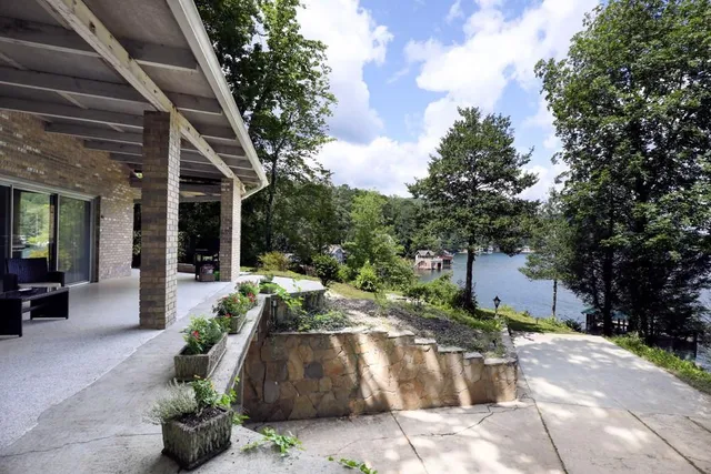 a bedroom with furniture and a chandelier