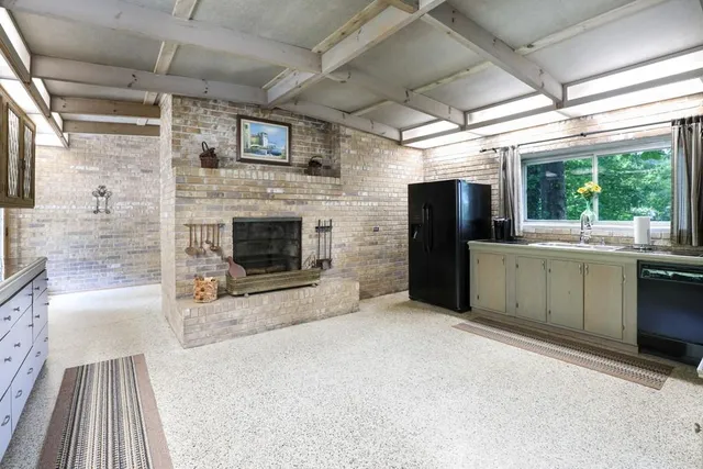 a view of a kitchen with a sink