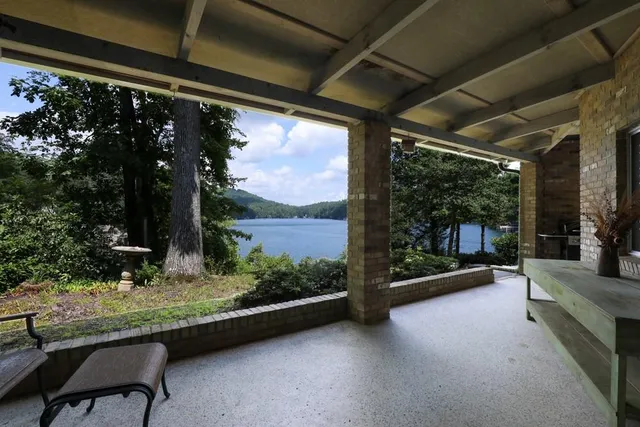 a view of a chairs and table in the patio