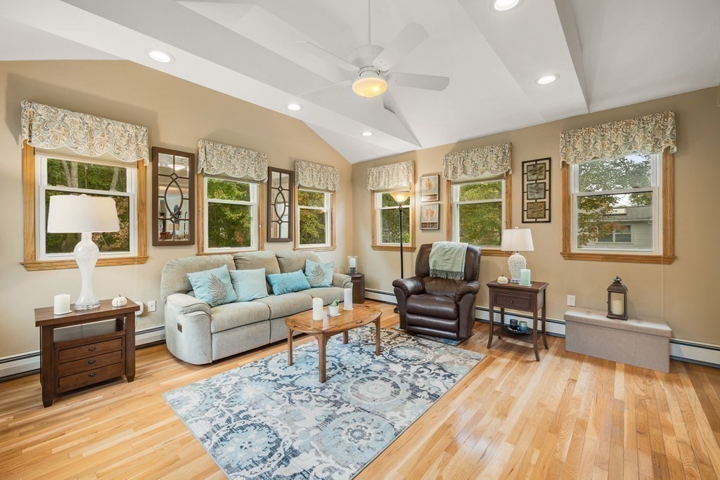 27 Phyllis Road Raynham, MA 02767 - Photo 15 of 42 a living room with furniture and a couch