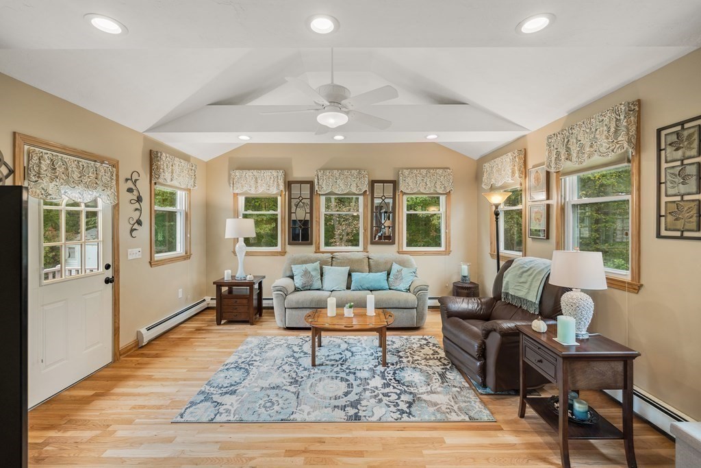 27 Phyllis Road Raynham, MA 02767 - Photo 18 of 42 a living room with furniture and a large window