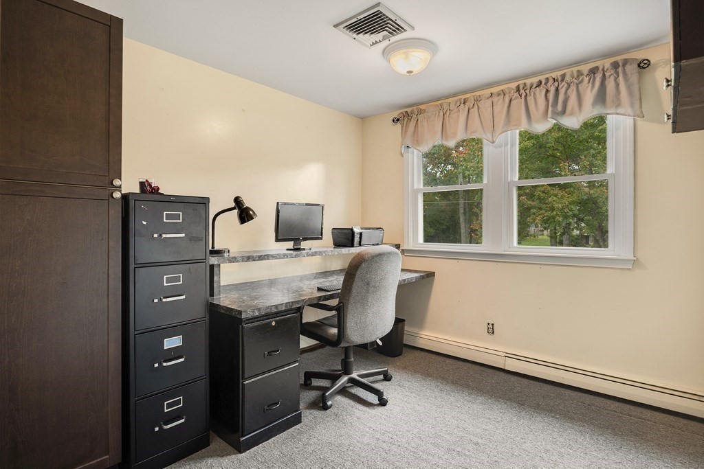27 Phyllis Road Raynham, MA 02767 - Photo 22 of 42 a view of a workspace with furniture and a window