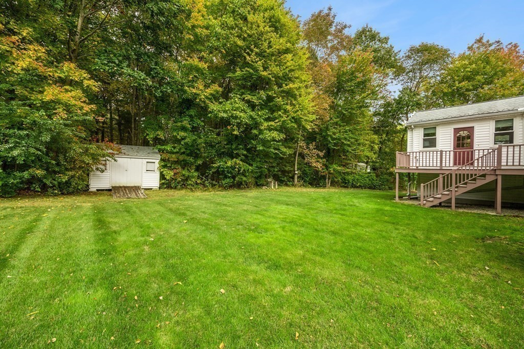 27 Phyllis Road Raynham, MA 02767 - Photo 35 of 42 a view of a house with backyard and garden