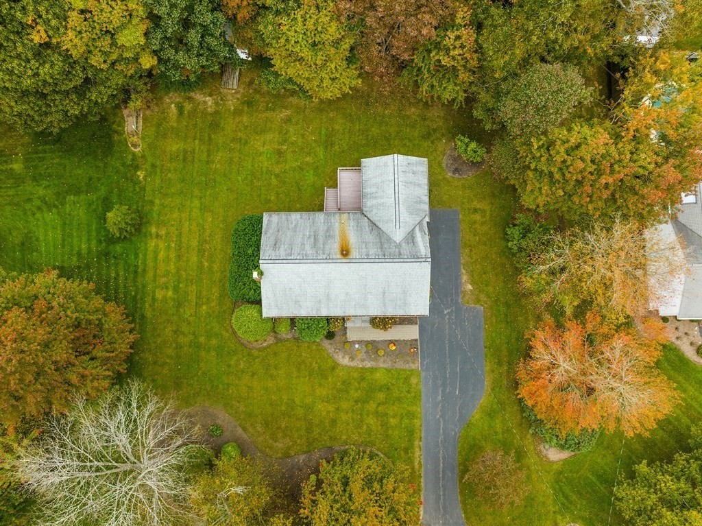 27 Phyllis Road Raynham, MA 02767 - Photo 40 of 42 a view of a lake from a yard