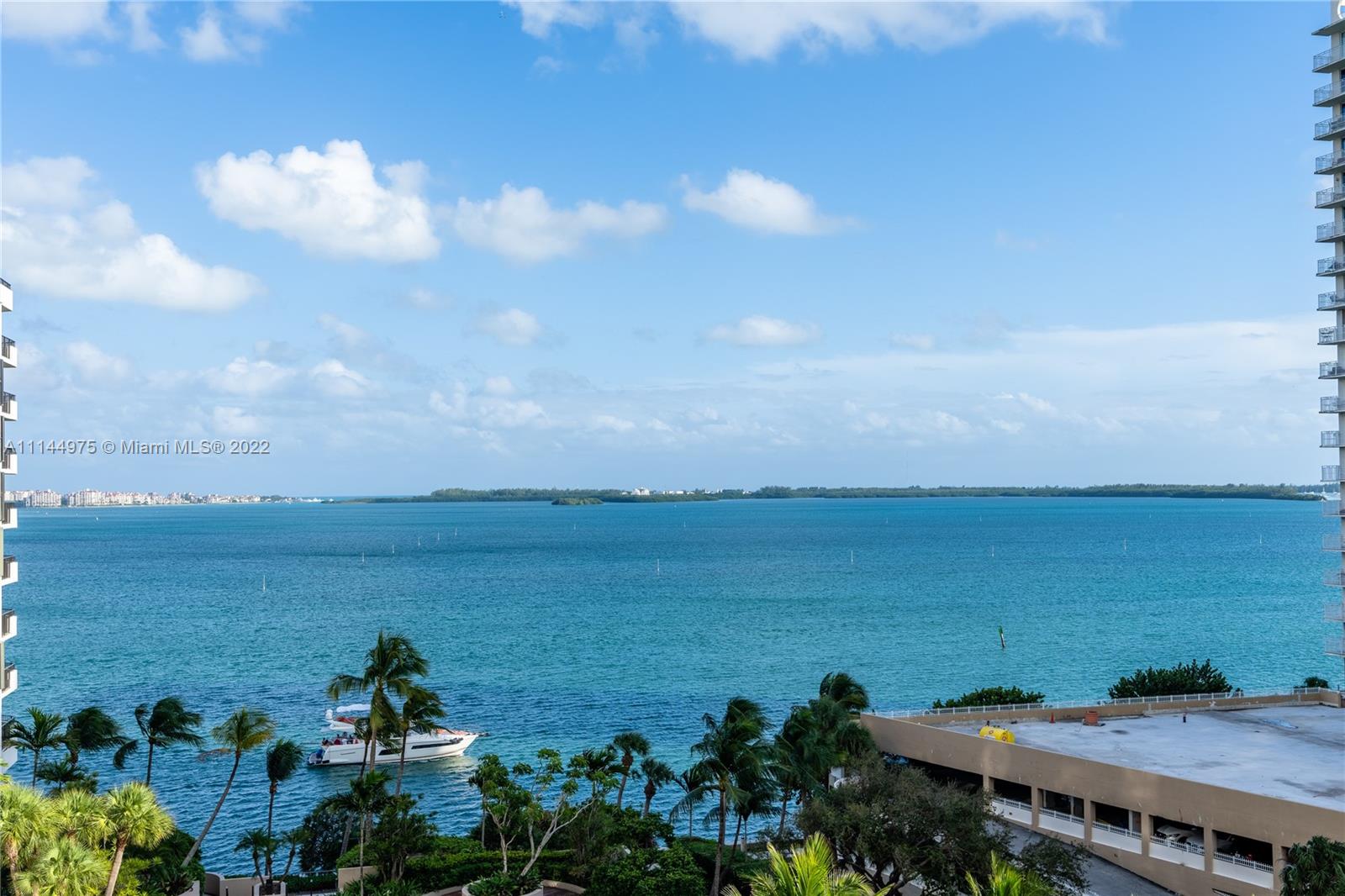 520 Brickell Key Drive, Unit A913 Miami, FL 33131 - Photo 12 of 18 a view of a bunch of trees and ocean