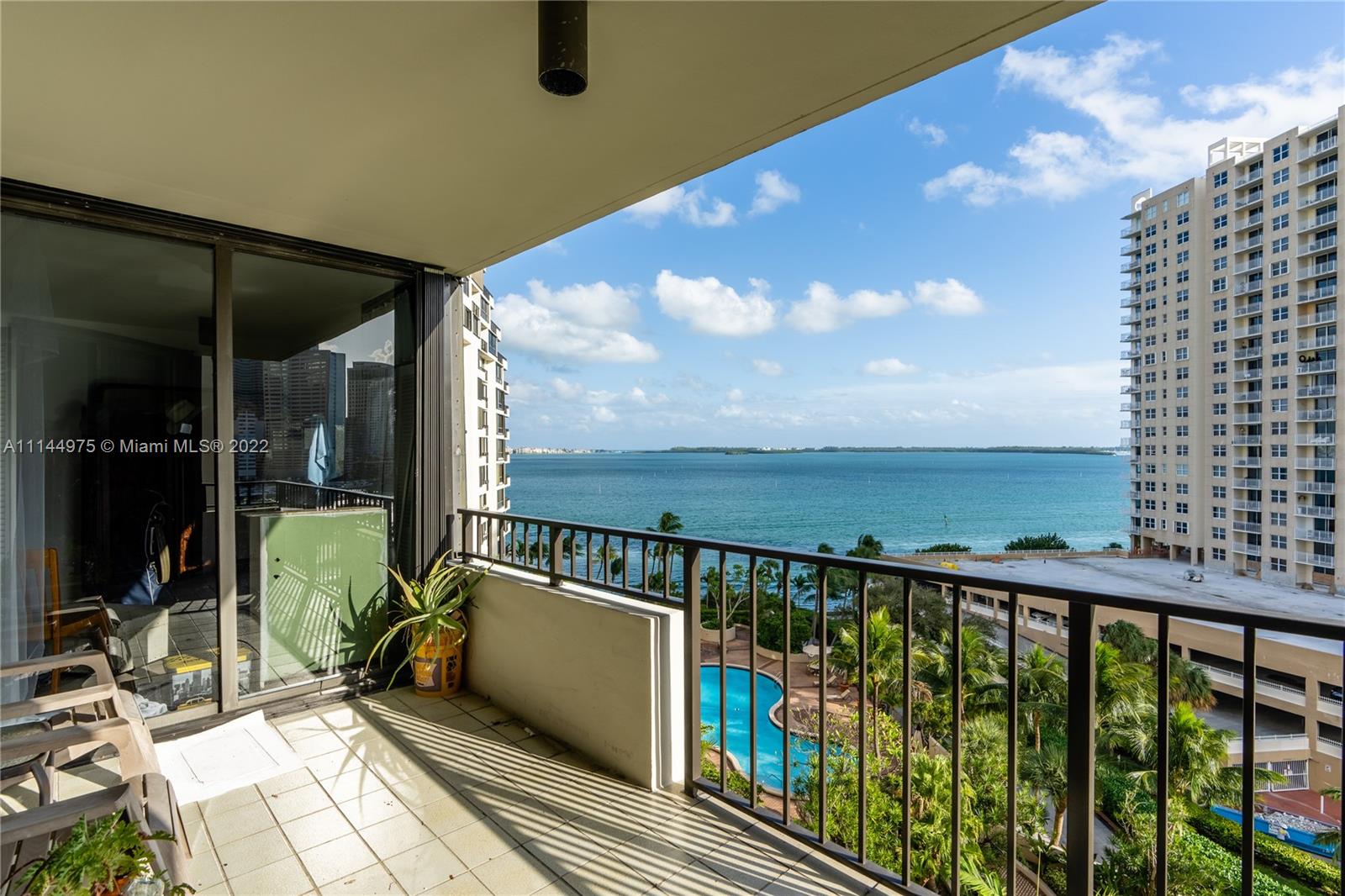 520 Brickell Key Drive, Unit A913 Miami, FL 33131 - Photo 14 of 18 a view of balcony with wooden floor