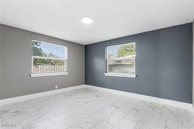 a view of an empty room with window