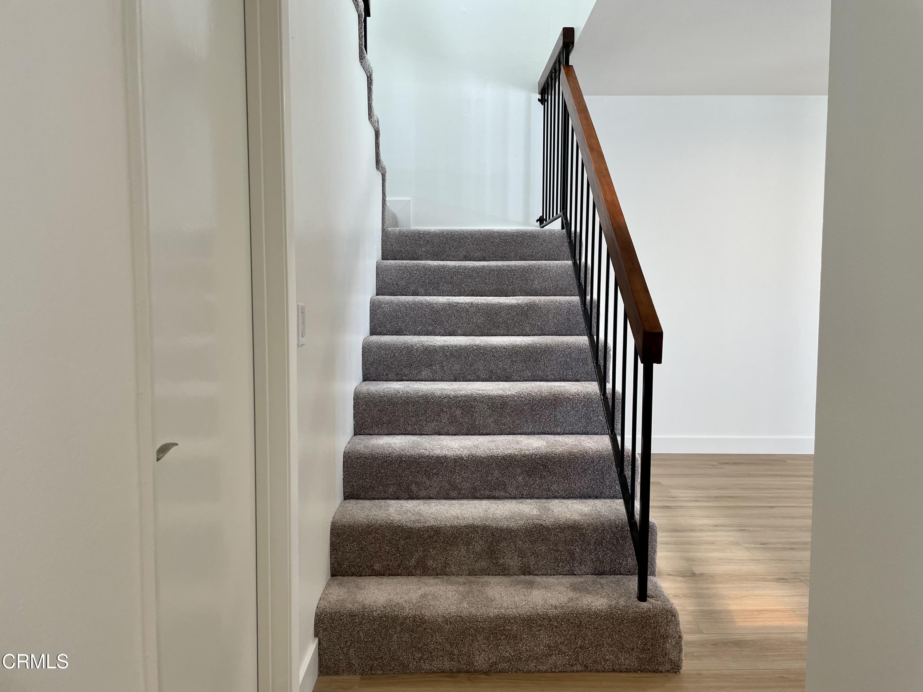 5115 Perkins Road Oxnard, CA 93033 - Photo 11 of 25 a view of staircase with white walls