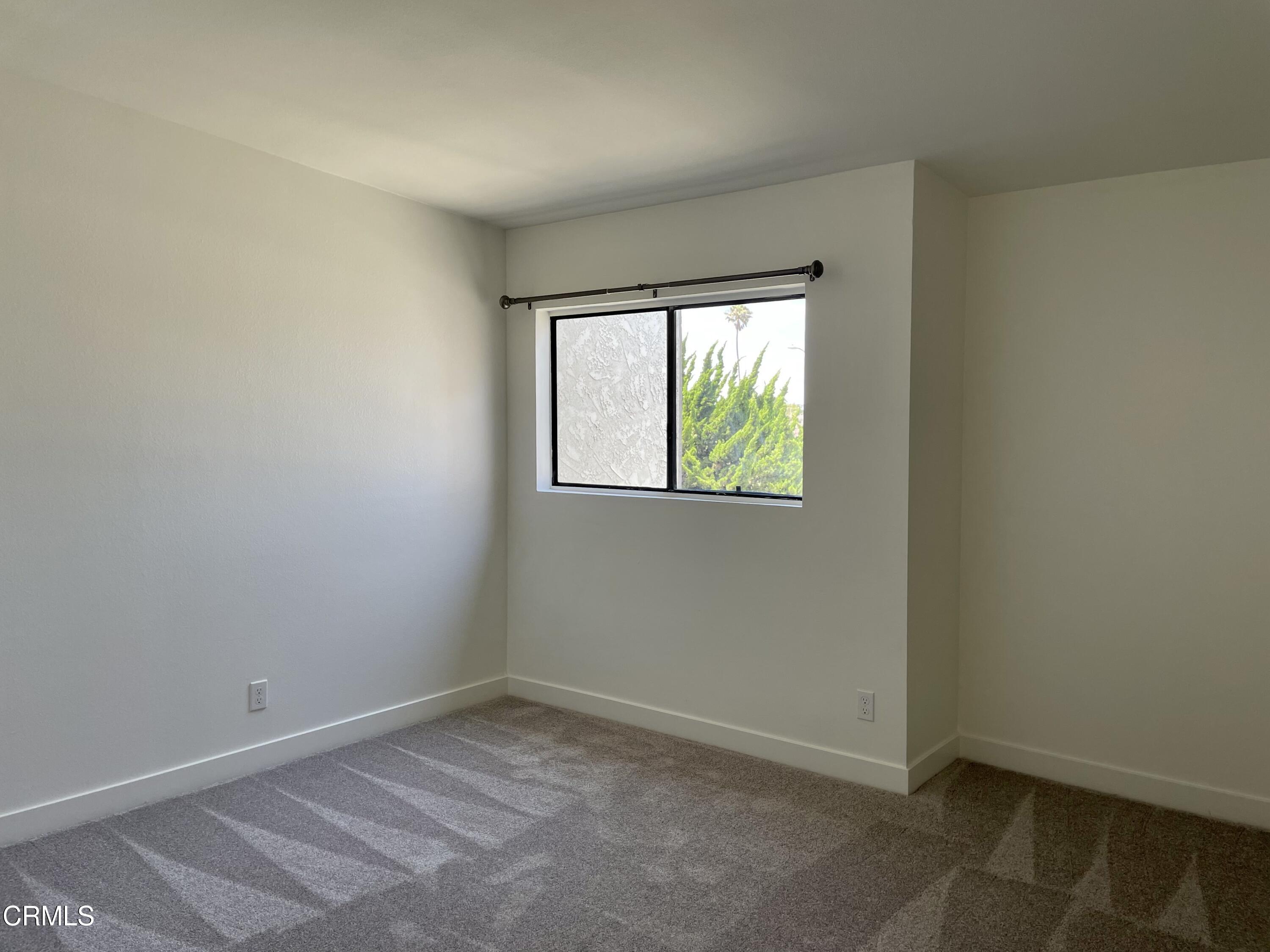 5115 Perkins Road Oxnard, CA 93033 - Photo 18 of 25 an empty room with a window