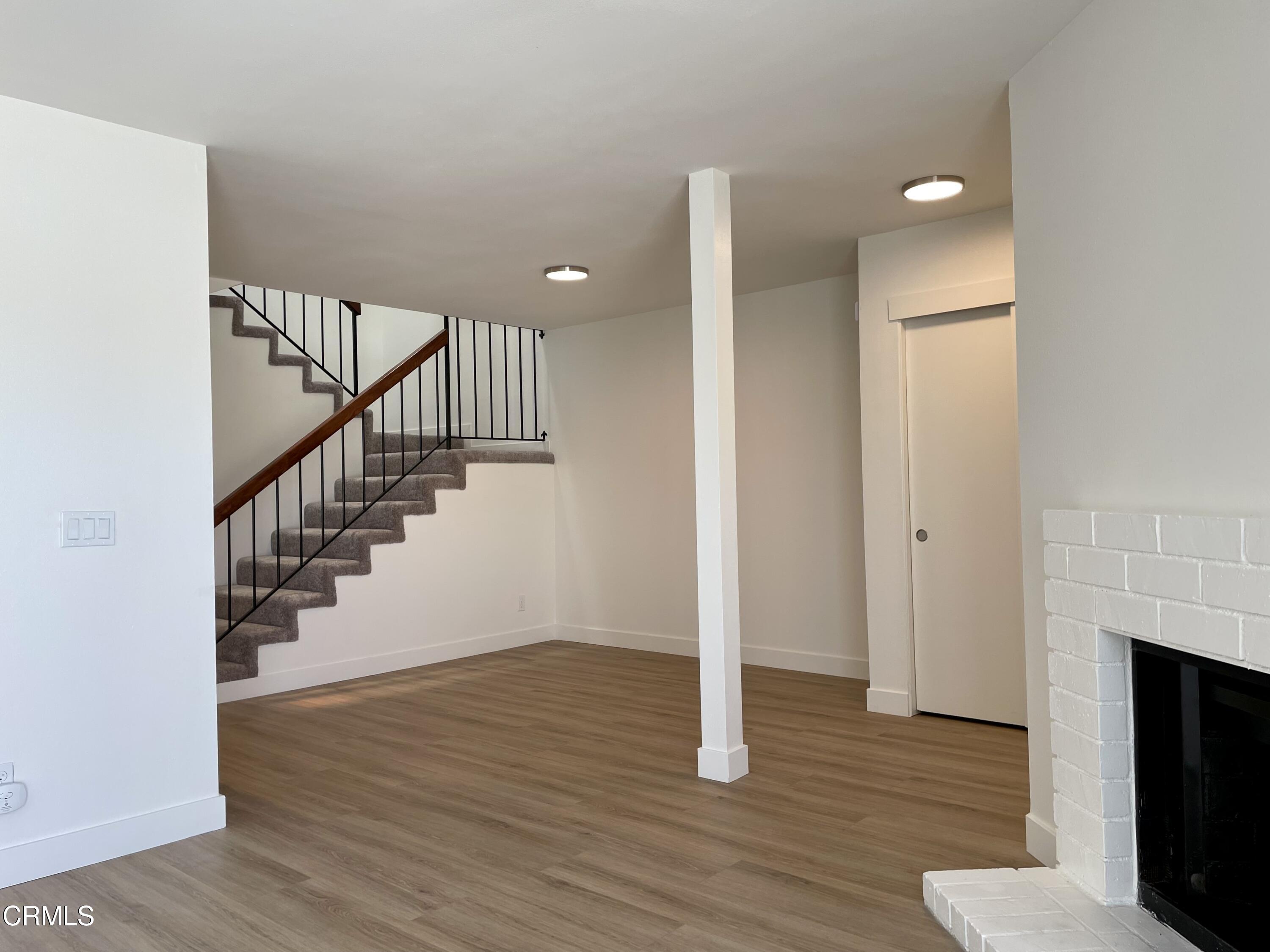 5115 Perkins Road Oxnard, CA 93033 - Photo 3 of 25 a view of entryway with wooden floor