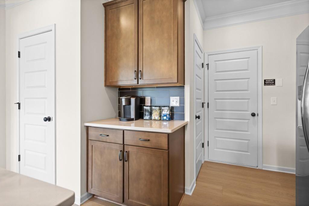 124 Sycamore Lane Calhoun, GA 30701 - Photo 18 of 43 a view of cabinets and wooden floor
