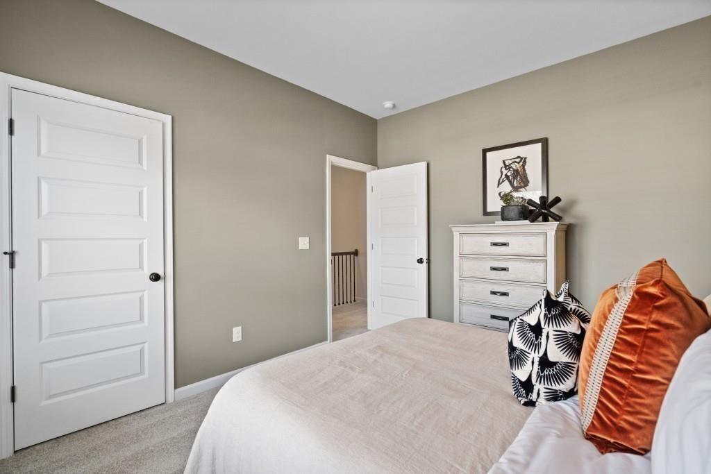 124 Sycamore Lane Calhoun, GA 30701 - Photo 35 of 43 a bedroom with a bed and a closet