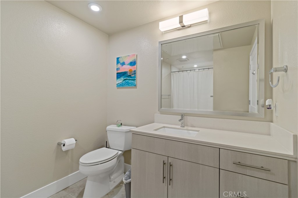 45009 Challenge Common, Unit 200 Fremont, CA 94538 - Photo 19 of 27 a bathroom with a sink and a toilet