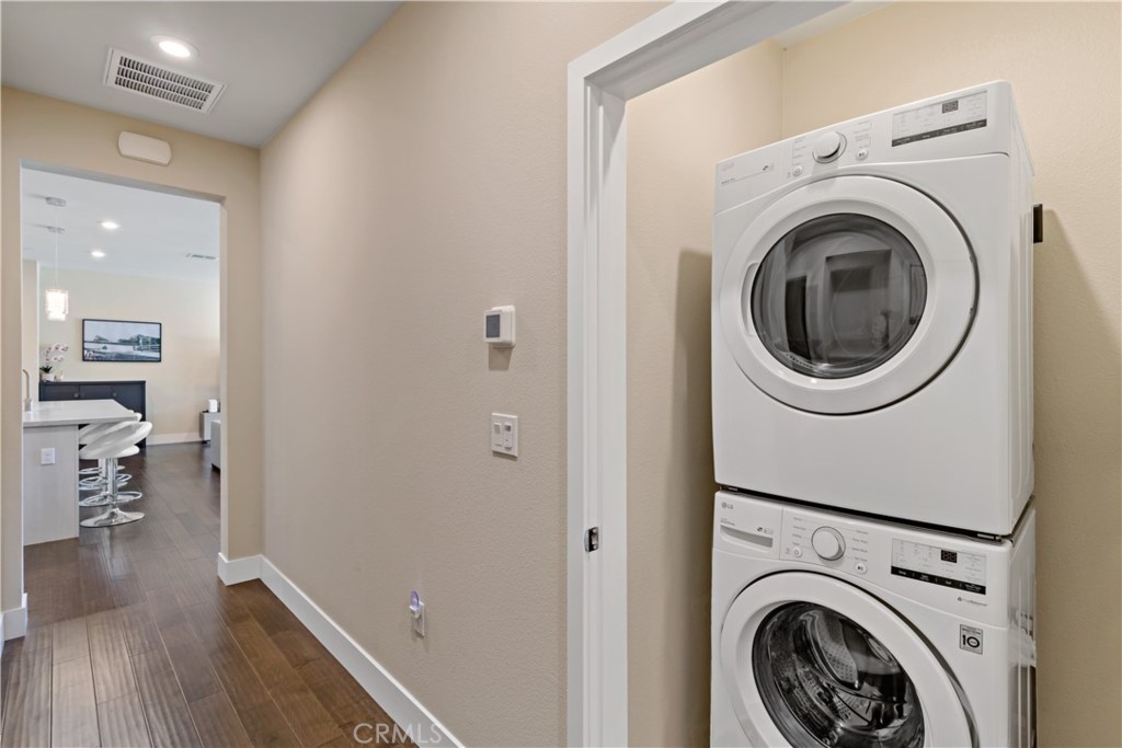 45009 Challenge Common, Unit 200 Fremont, CA 94538 - Photo 20 of 27 a view of a hallway with washer and dryer