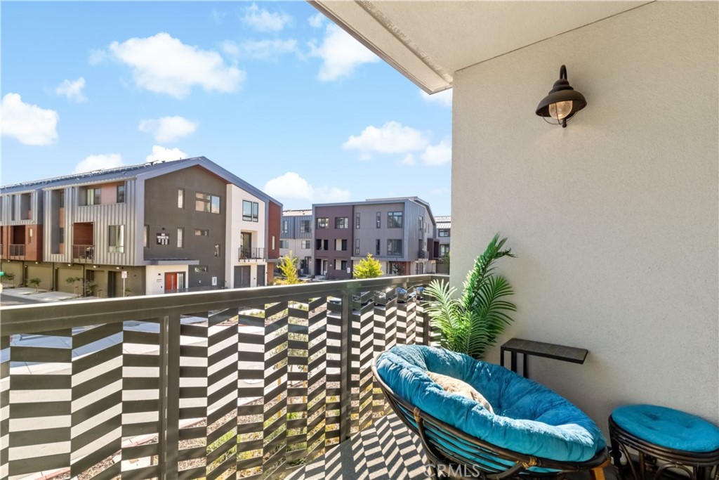 45009 Challenge Common, Unit 200 Fremont, CA 94538 - Photo 21 of 27 a view of a chair and table in the balcony