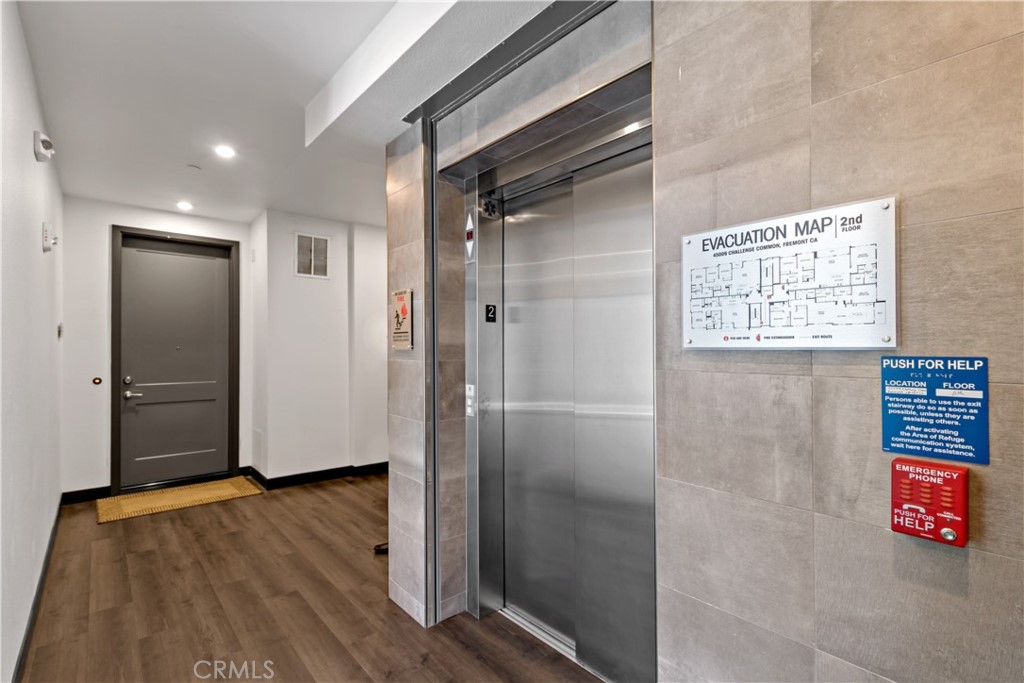 45009 Challenge Common, Unit 200 Fremont, CA 94538 - Photo 22 of 27 a view of elevator with hallway
