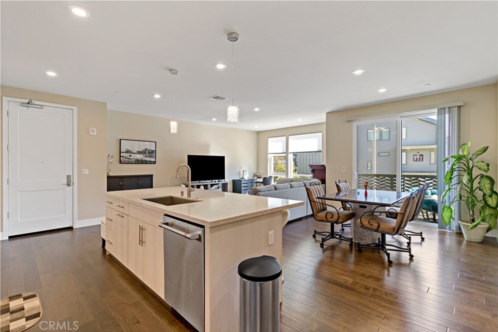 45009 Challenge Common, Unit 200 Fremont, CA 94538 - Photo 8 of 27 a view of a dining room with furniture and wooden floor