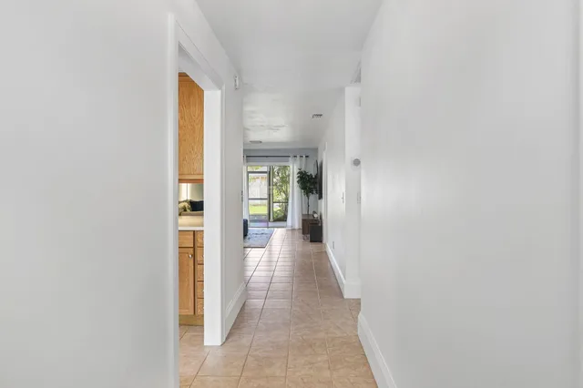a kitchen with granite countertop cabinets and stainless steel appliances