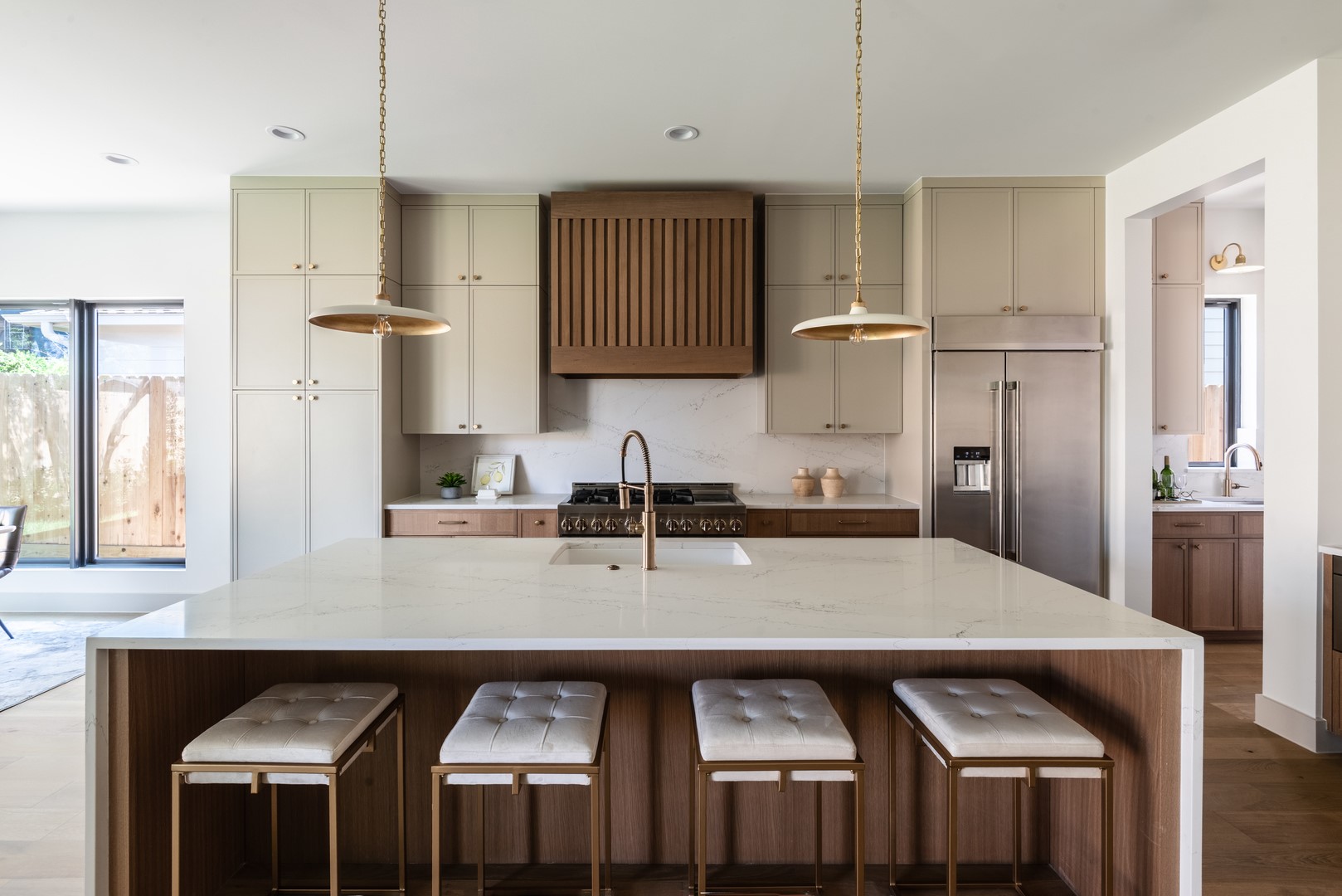 1310 Chantilly Lane Houston, TX 77018 - Photo 11 of 26 a kitchen with granite countertop a table chairs microwave and cabinets