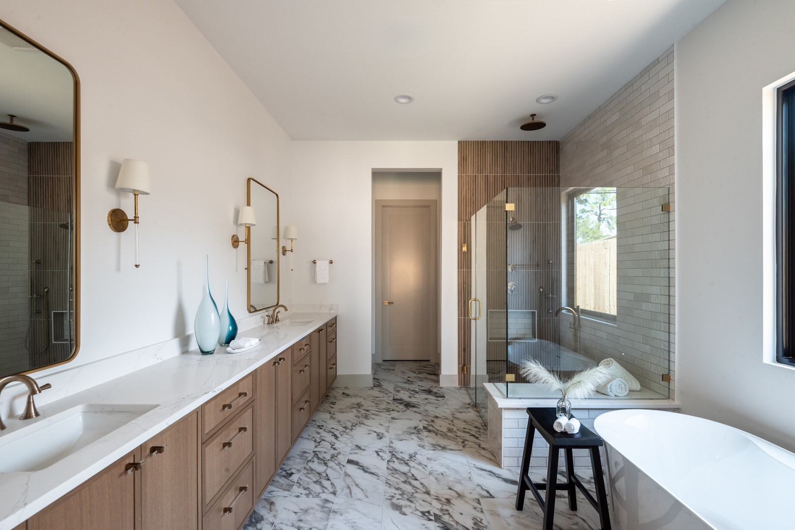 1310 Chantilly Lane Houston, TX 77018 - Photo 18 of 26 a bathroom with double vanity sinks and a mirror
