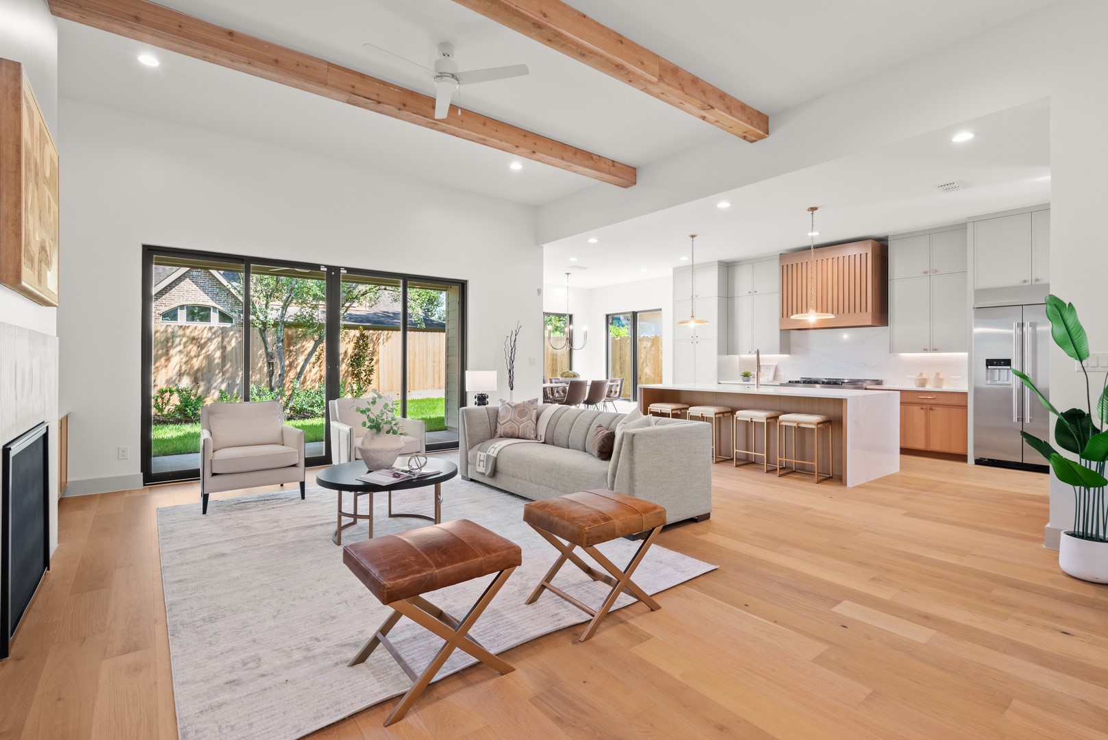 1310 Chantilly Lane Houston, TX 77018 - Photo 2 of 26 a living room with furniture and a open kitchen view