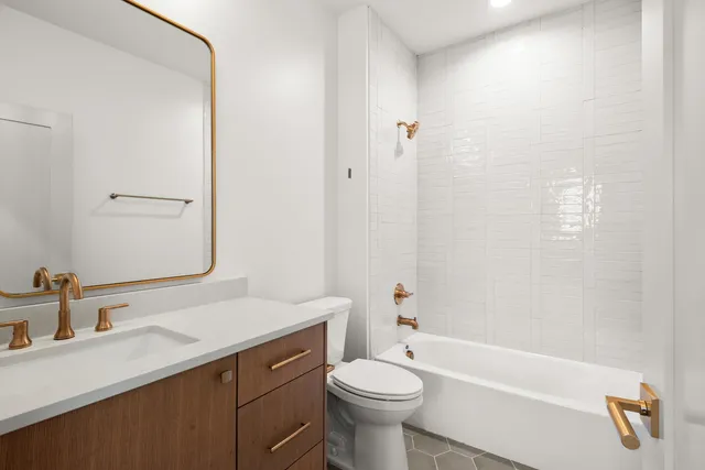 a view of bedroom with a bed and furniture